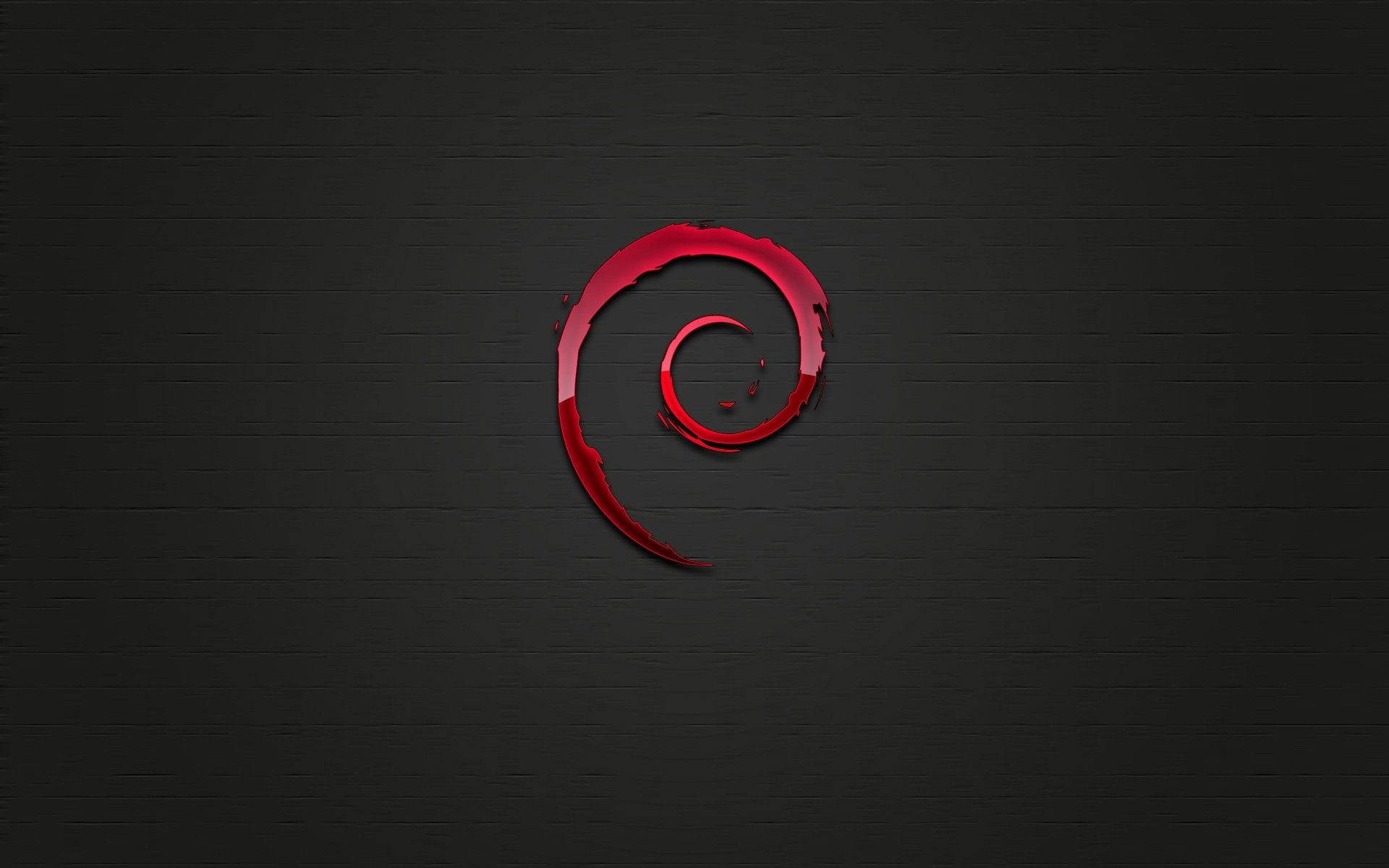 深色木質背景上的紅色螺旋標誌 — Kali Linux 壁紙