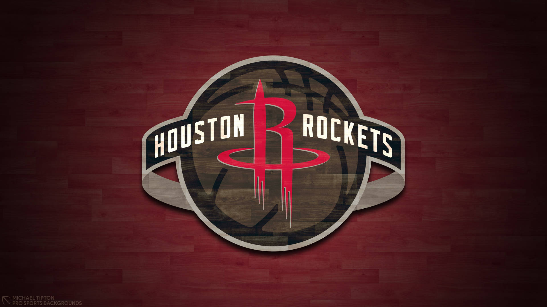 休士頓火箭籃球隊標誌在木地板背景上。 — Jordan Logo 壁紙