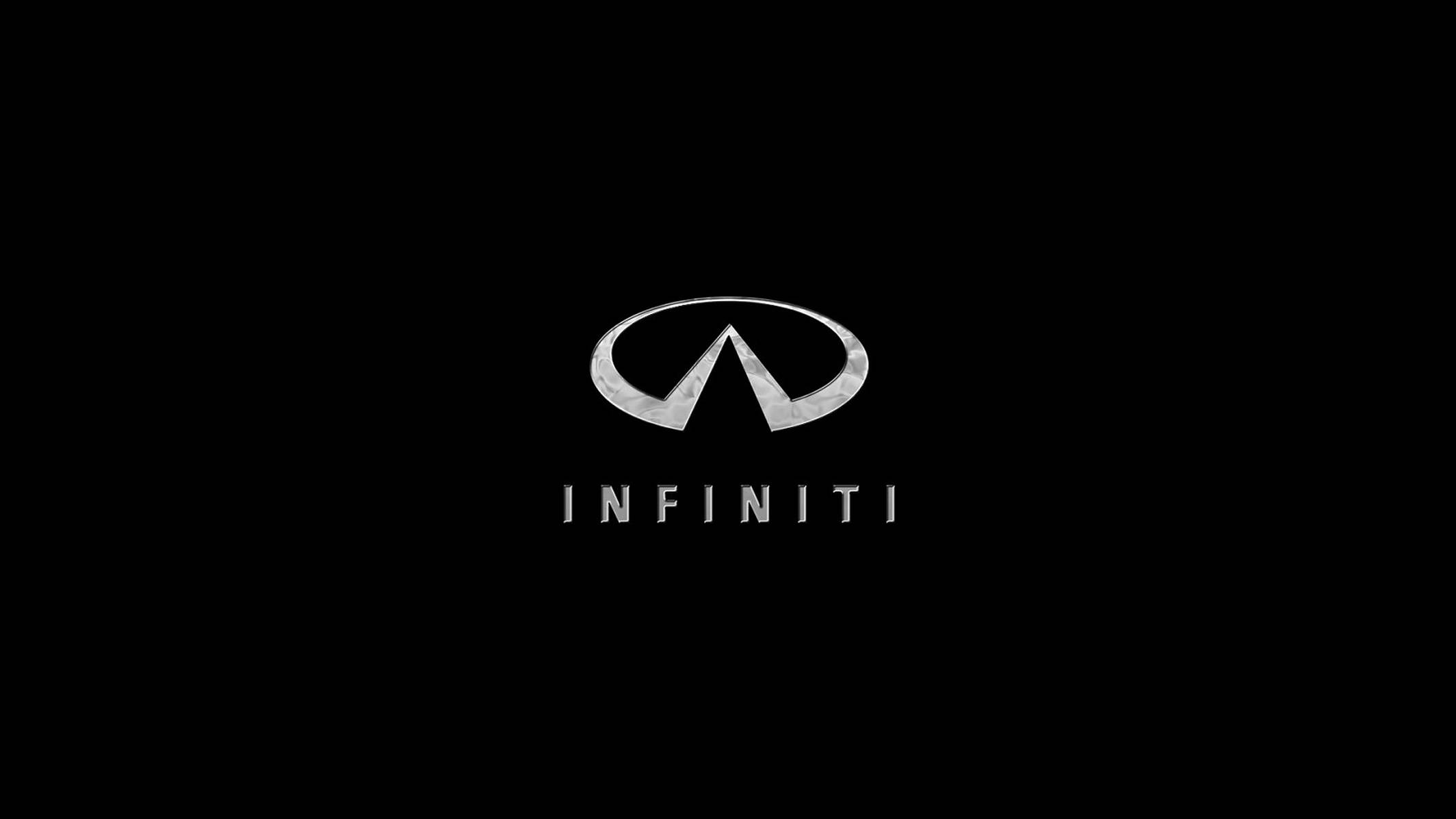 Infiniti 桌布 壁紙 — Infiniti 標誌在純黑色背景上閃耀金屬銀色光澤，下方為品牌名稱。