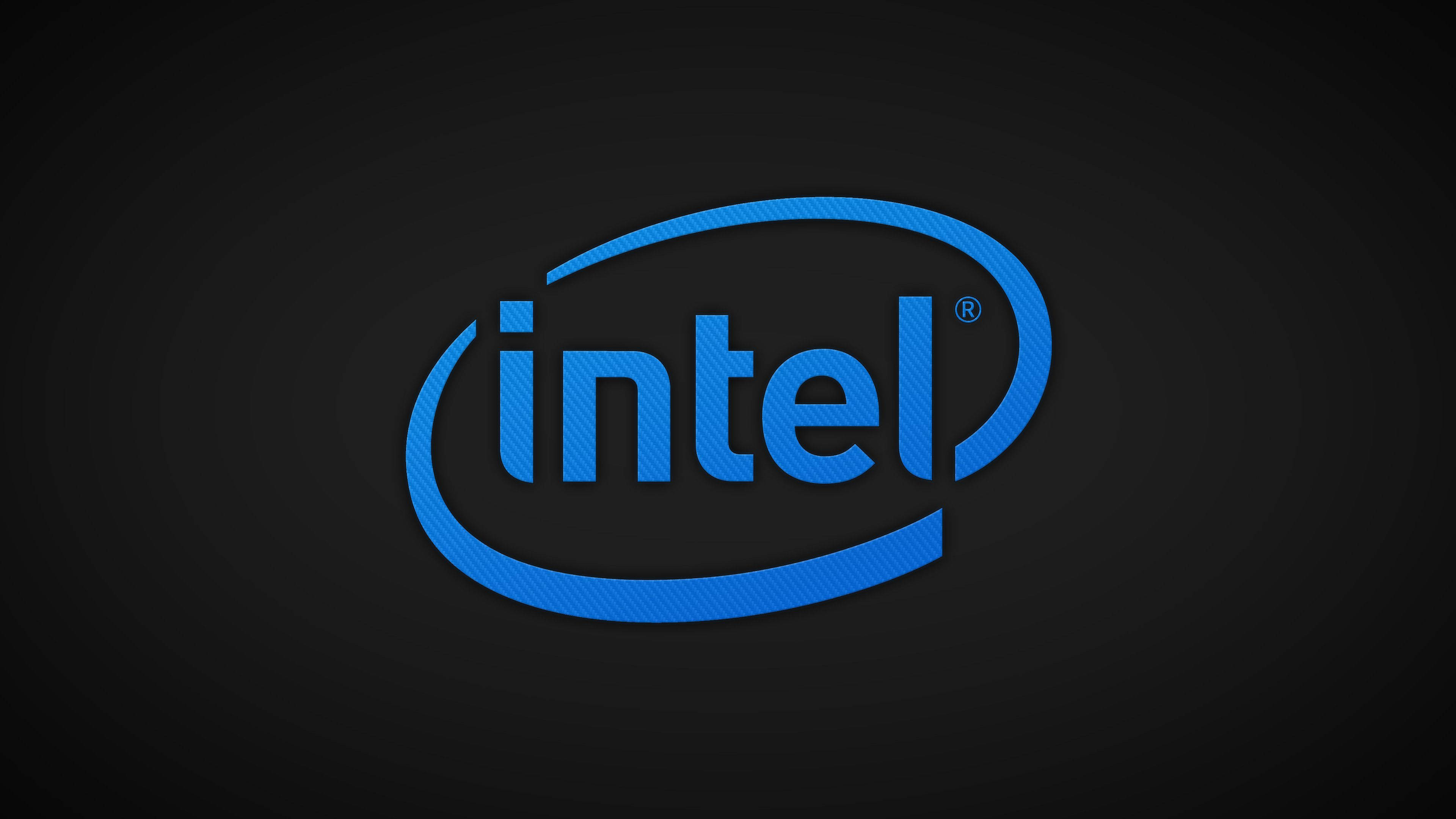 nvidia 桌布 壁紙 — Intel 標誌以鮮豔的藍色搭配紋理圖案，在深色漸變背景上發光。