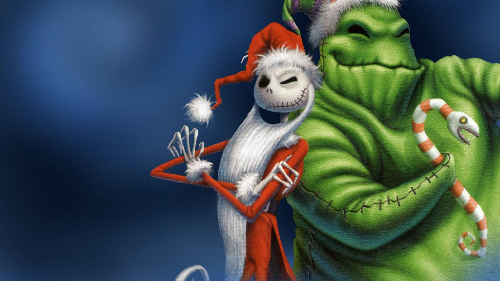 The Nightmare Before Christmas 桌布 壁紙 — Jack Skellington 和綠色幽靈戴著聖誕帽，在深藍色背景前與拐杖糖蛇一起擺姿勢。