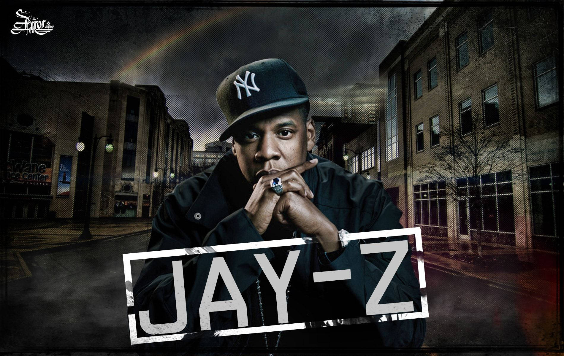 Jay-z 桌布 壁紙 — Jay-Z 在黑暗天空下帶著微弱彩虹的粗糙城市街道場景中，強烈地凝視著鏡頭。