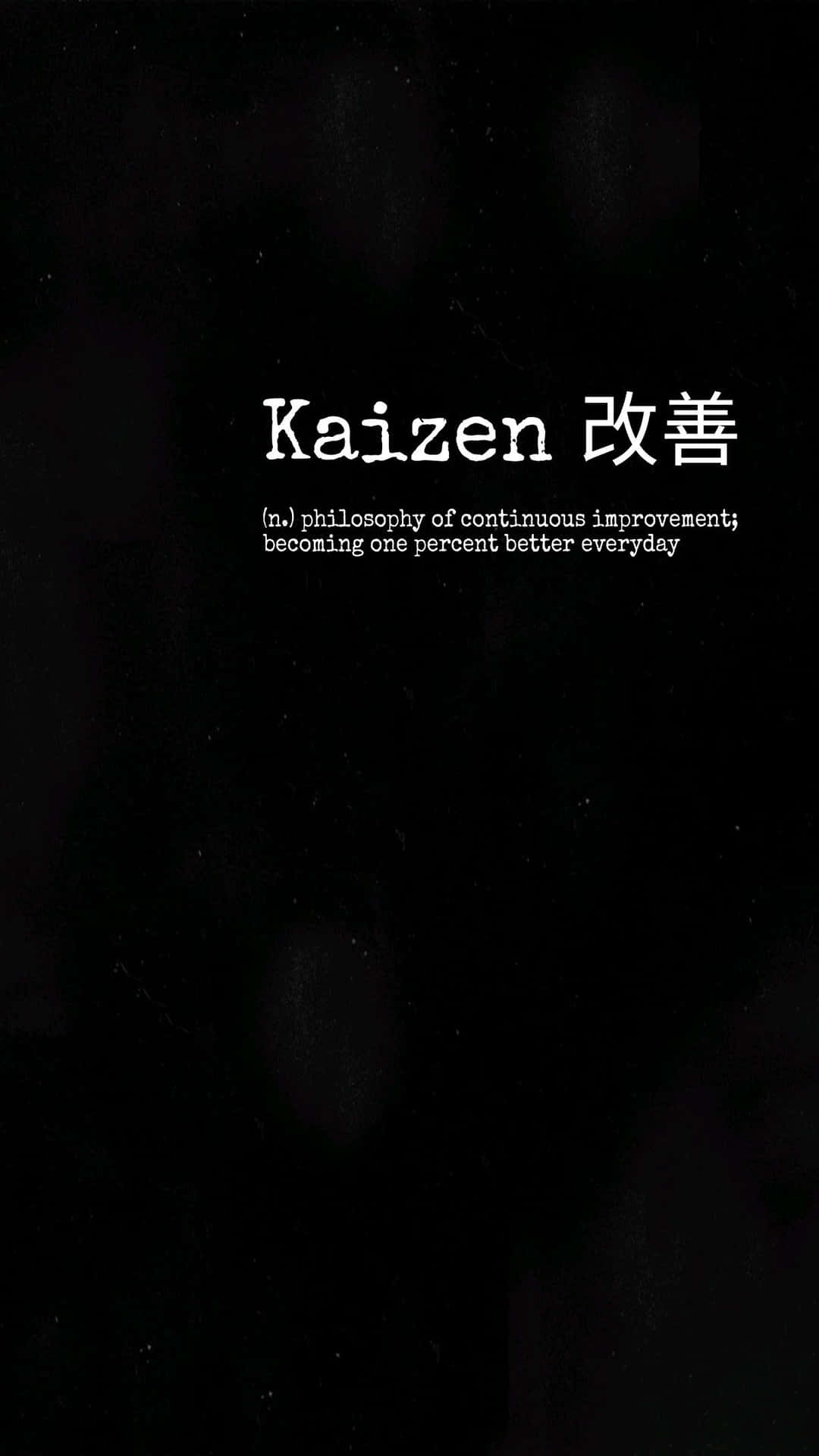  壁紙 — 極簡黑色背景，白色文字將 Kaizen 定義為持續改進的哲學。
