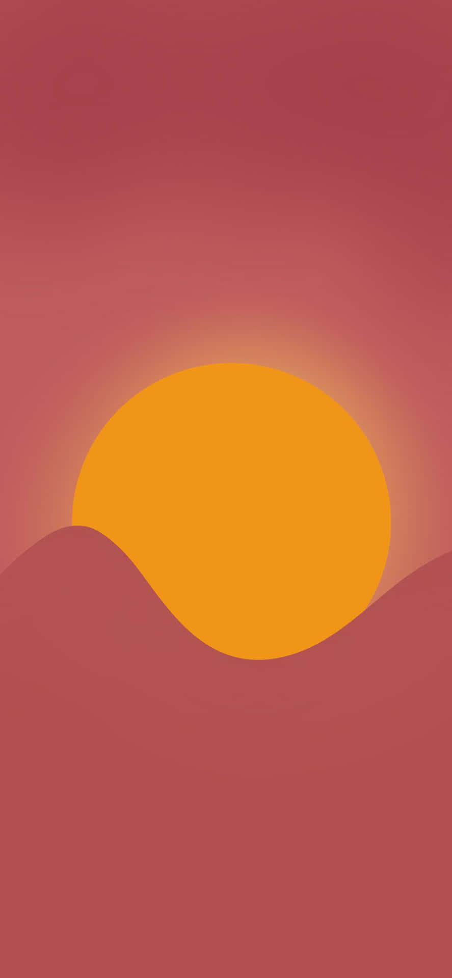 極簡日落，橙色太陽在粉紅色山丘上 — iPhone 13 壁紙