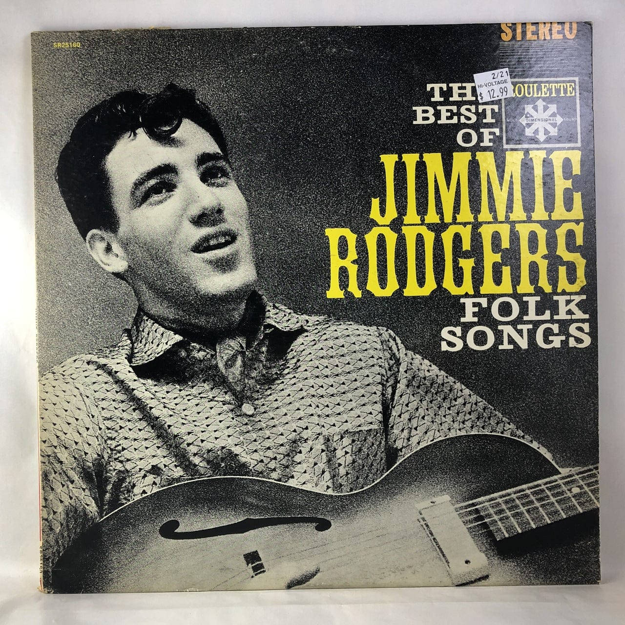 專輯封面 桌布 壁紙 — Jimmie Rodgers 手持吉他的復古黑白專輯封面，帶有粗體黃色文字。