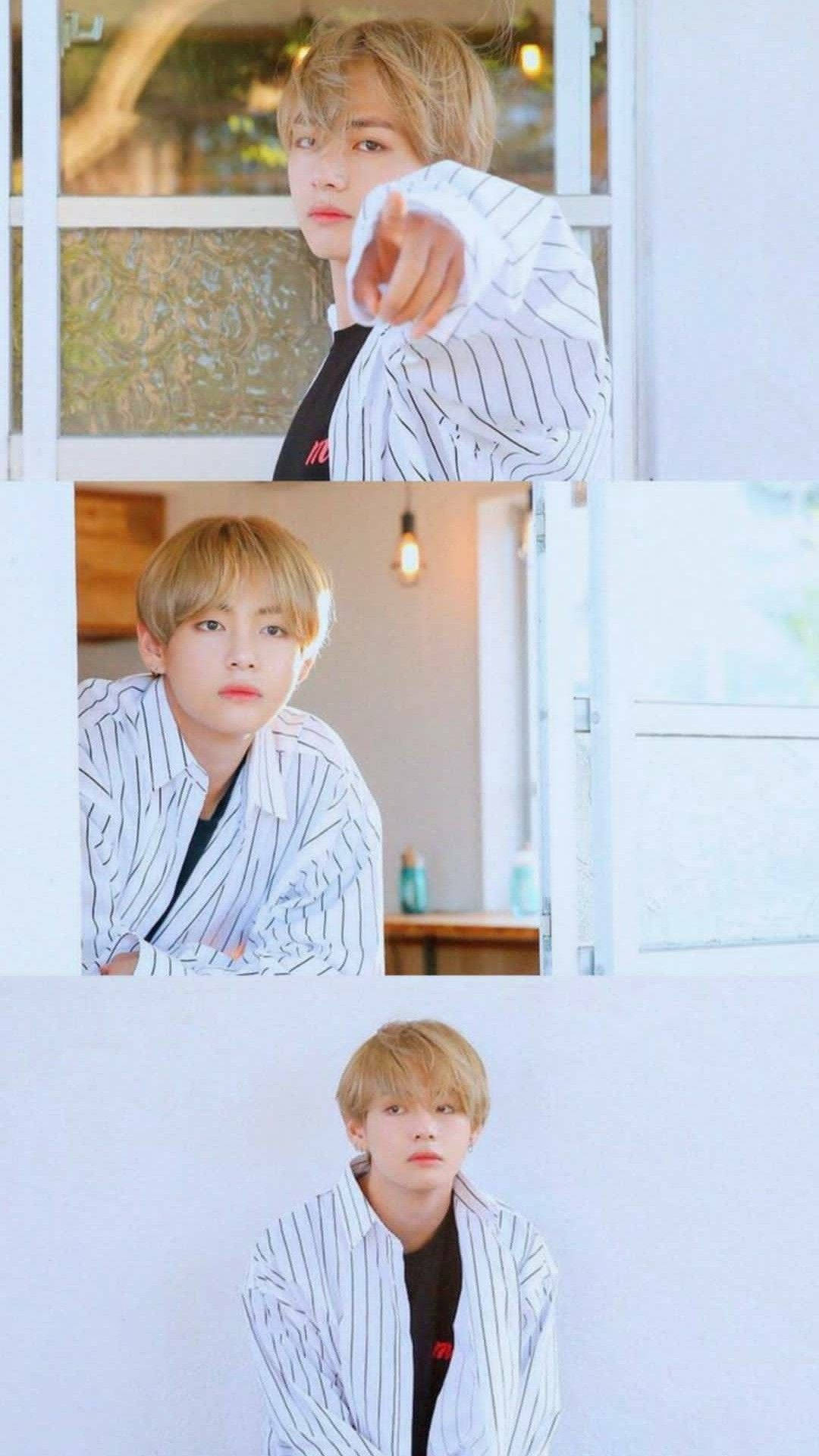 金髮年輕男子穿著條紋襯衫在室內指向觀眾 — Bts 壁紙