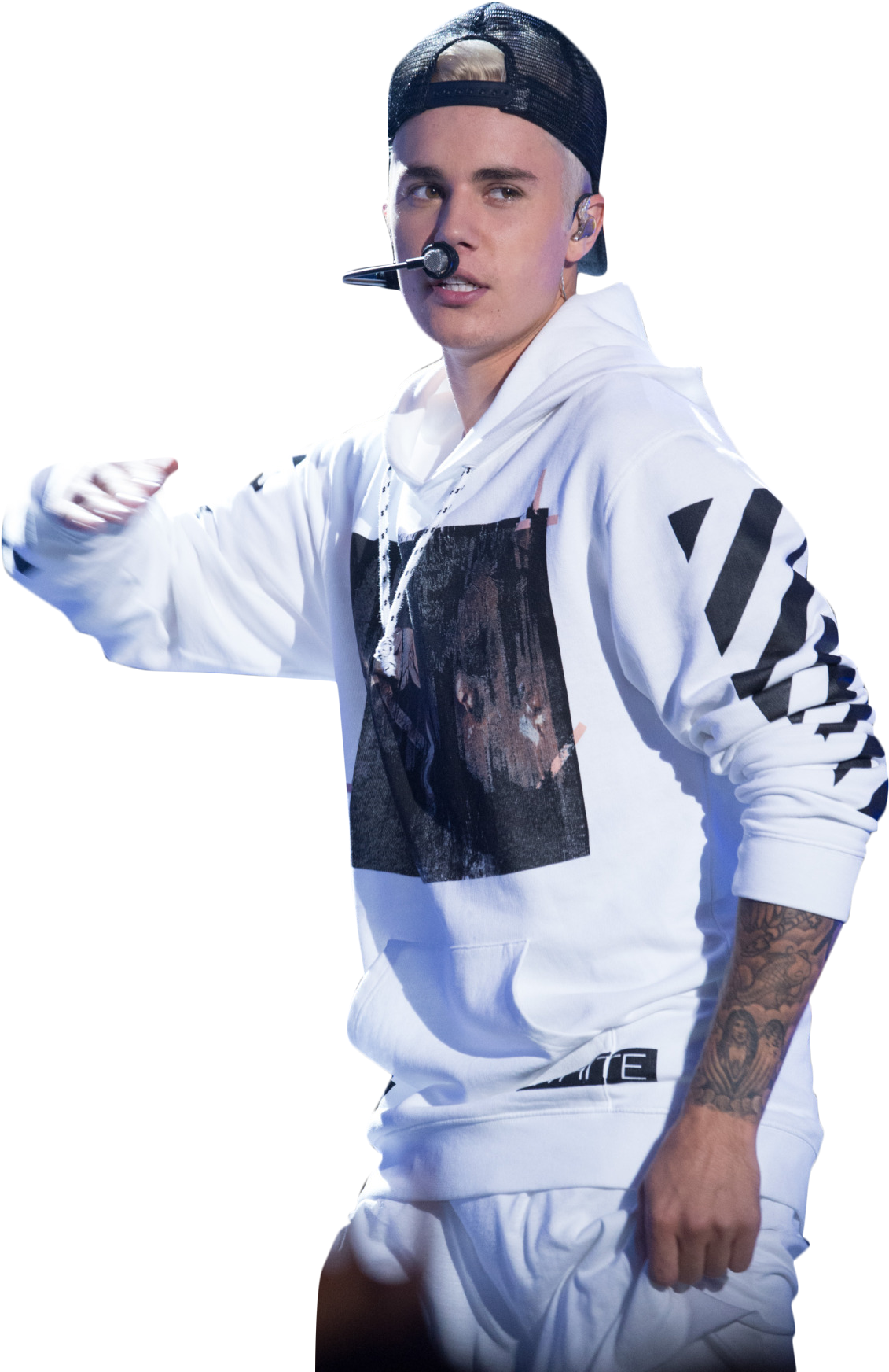 Singer 桌布 壁紙 — Justin Bieber 在黑色背景的明亮舞台燈光下，穿著白色連帽衫和帽子在舞台上表演。