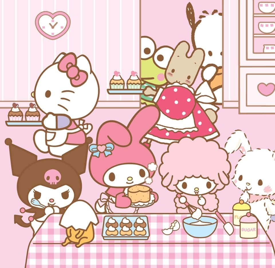 Sanrio角色在粉紅色廚房裡烤紙杯蛋糕，並有愛心裝飾。 — Hello Kitty 壁紙