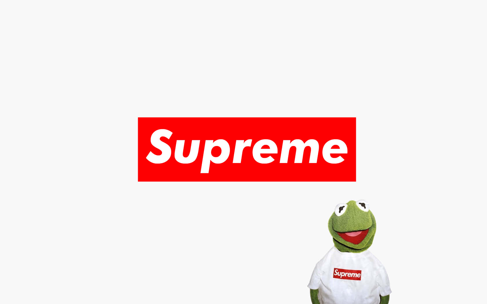 Aesthetic Kermit 桌布 壁紙 — Kermit the Frog 在純白色背景上，在一個大紅色Supreme標誌下方穿著一件白色Supreme T恤。