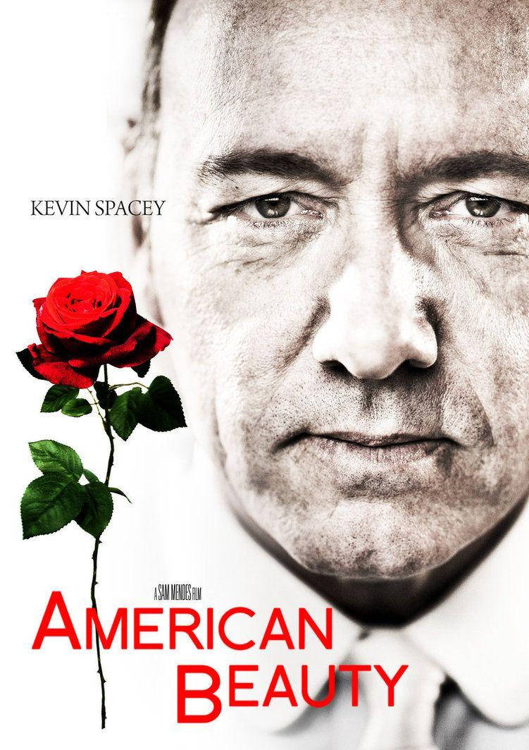 美女 桌布 壁紙 — Kevin Spacey 的鮮明黑白肖像，臉旁有一朵鮮紅的玫瑰，營造出戲劇性的強烈感。