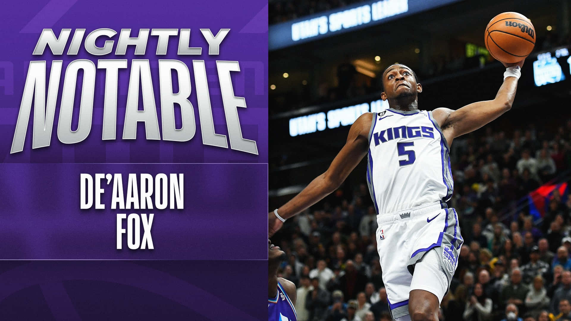 De'Aaron Fox 在半空中身穿國王隊球衣於比賽中投籃。 — NBA 壁紙