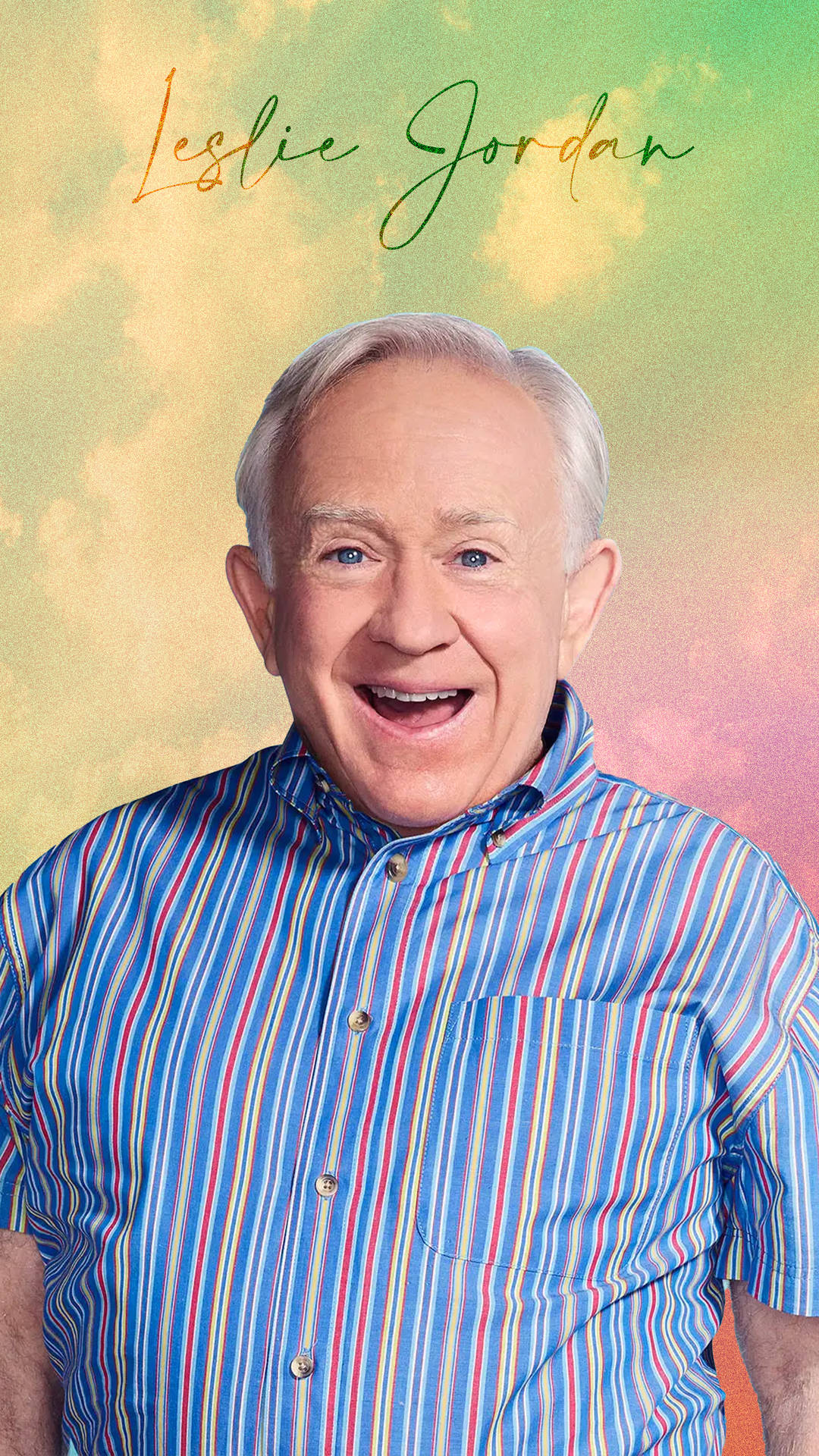 Leslie Jordan 身穿彩色條紋襯衫，在柔和漸變背景中微笑。 — Jordan Logo 壁紙
