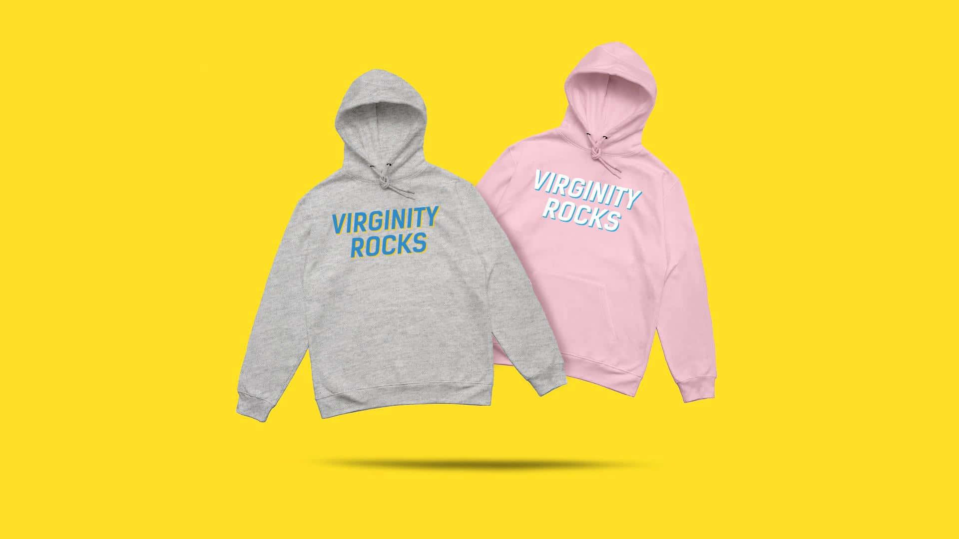  壁紙 — 兩件灰色和粉紅色的連帽衫，上面有「VIRGINITY ROCKS」文字，漂浮在亮黃色背景上。