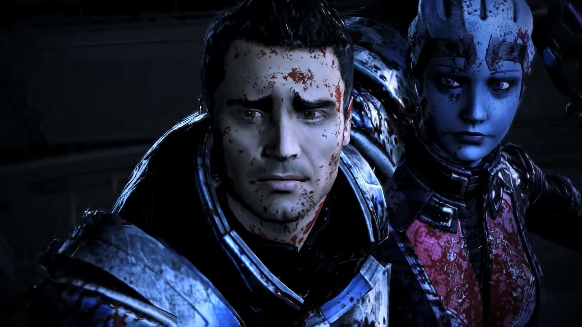 Mass Effect Legendary Edition 桌布 壁紙 — 兩名裝甲戰士滿臉鮮血，站在昏暗的科幻場景中，一人類一外星人，兩者表情都顯得激烈。