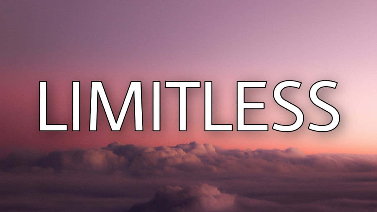 Word 桌布 壁紙 — 「limitless」一詞以粗體白色字母在夢幻般的暮色天空中發光，天空充滿柔和的粉紅色和紫色雲彩。