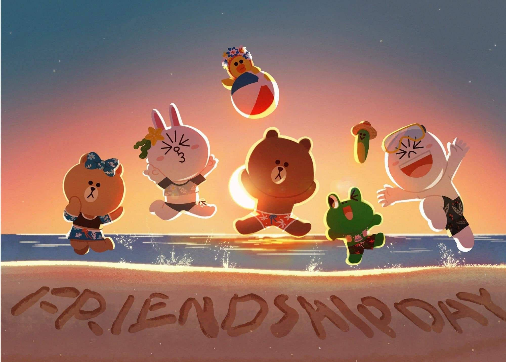Line 桌布 壁紙 — Line friends 角色在日落時分的沙灘上歡樂跳躍，沙灘上寫著「FRIENDSHIP DAY」。