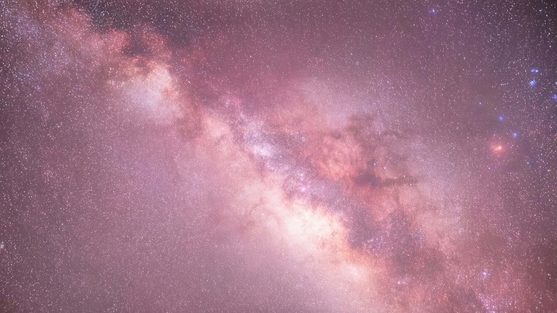 Pastel Pink Galaxy Nebula 壁紙 — 令人嘆為觀止的銀河系景觀，在星空中閃耀著粉紅色和紫色的星雲。
