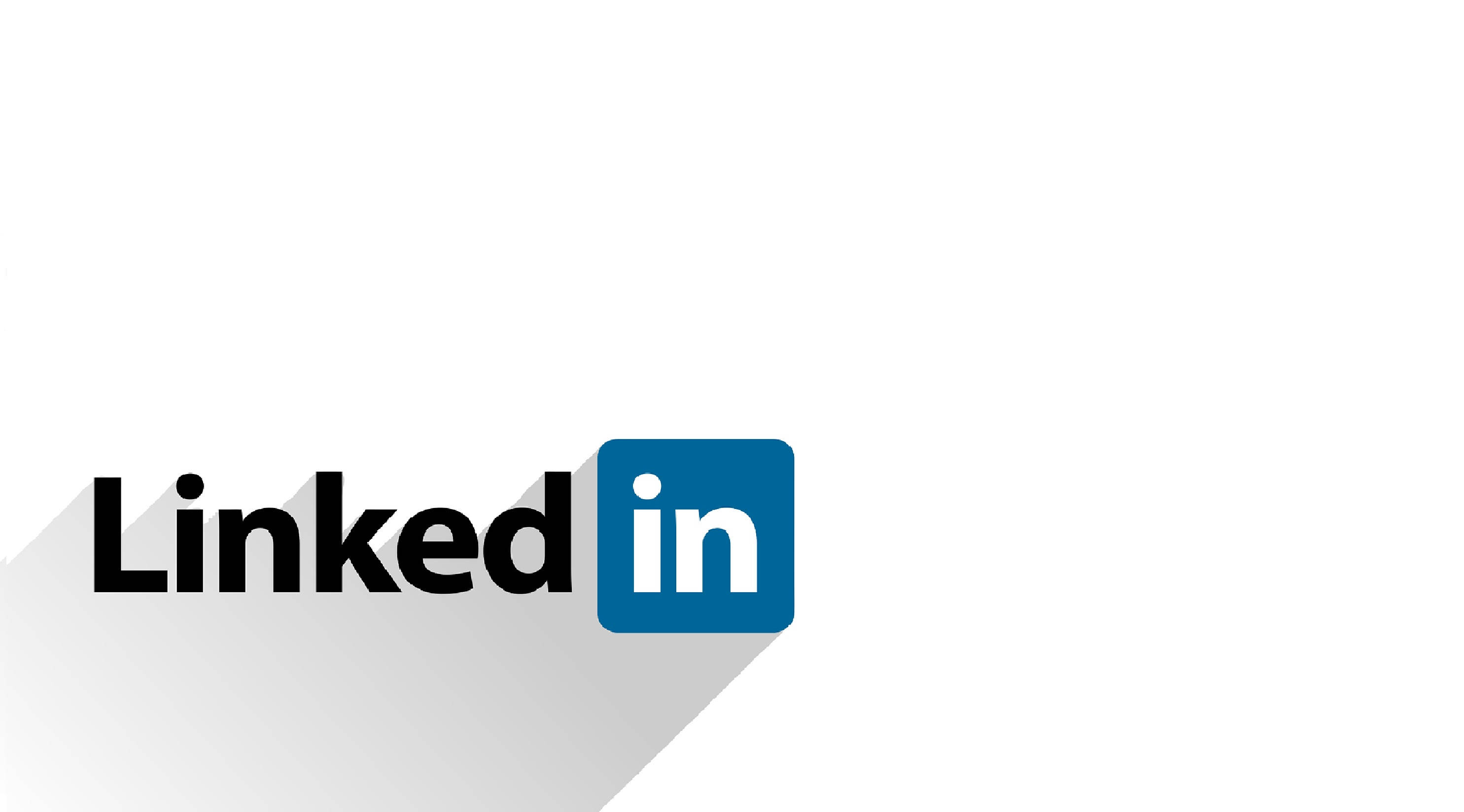 領英 桌布 壁紙 — LinkedIn 標誌，帶有粗體黑色文字和藍色方形圖示，在白色背景上投射出長長的陰影。