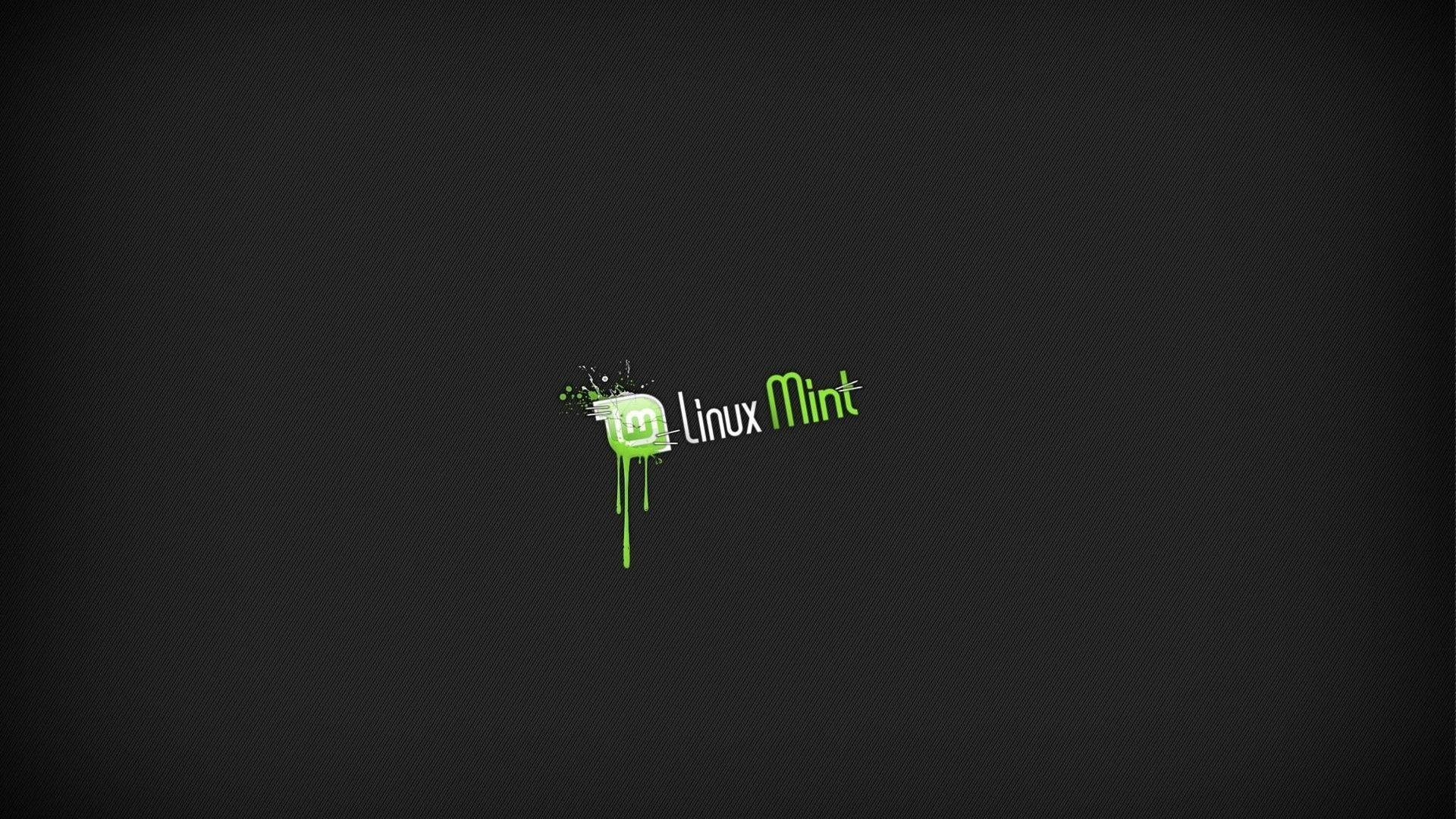 Linux 桌布 壁紙 — Linux Mint 標誌，帶有綠色油漆飛濺在深色紋理背景上。