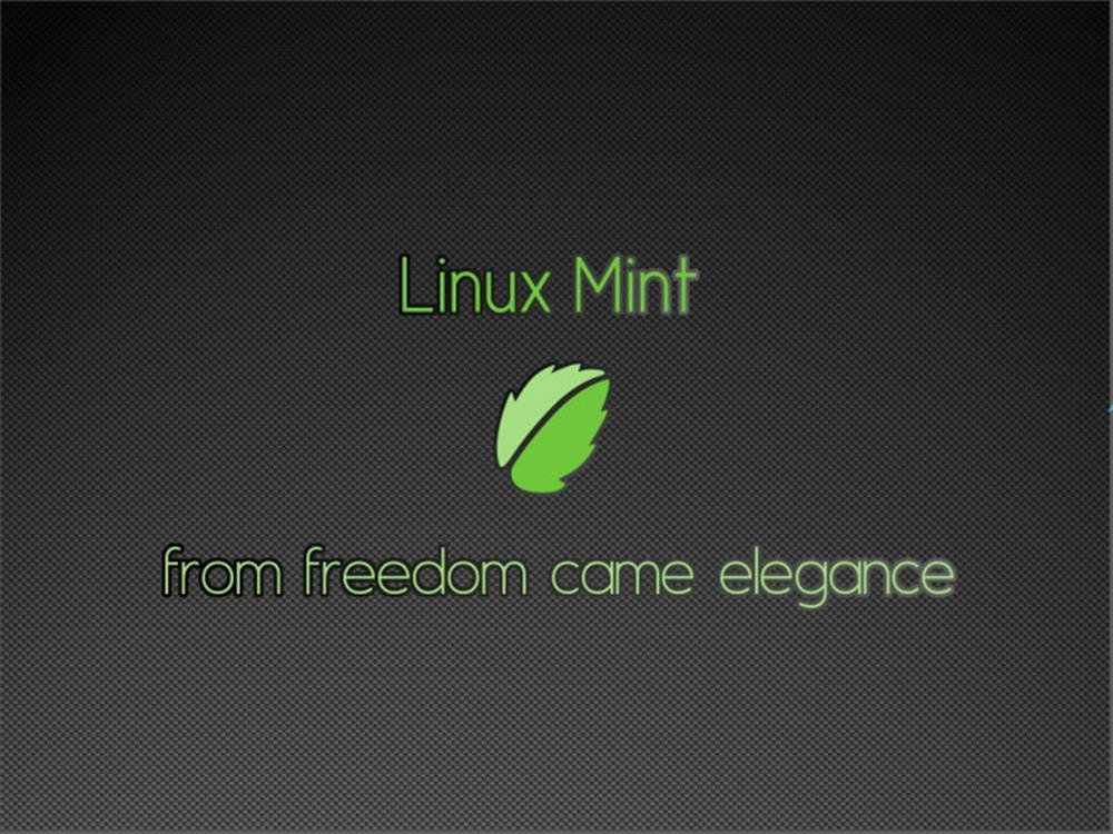 Linux 桌布 壁紙 — Linux Mint 標誌，帶有綠色葉子和標語，背景為深色紋理。