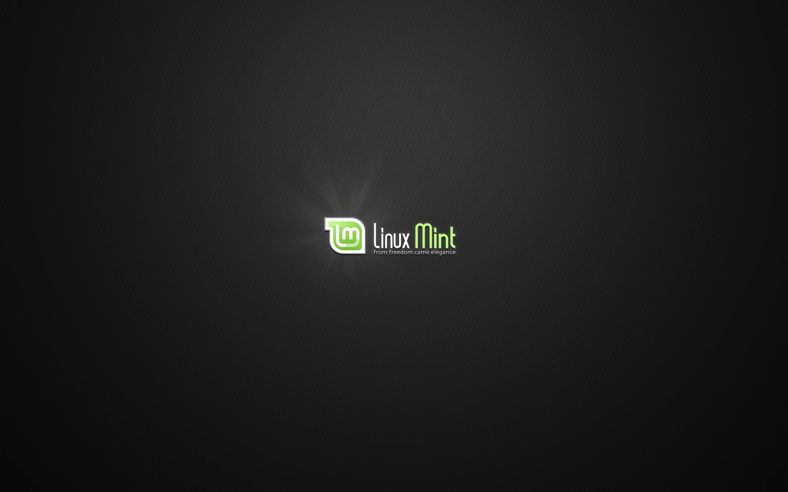 Linux Mint 桌布 壁紙 — Linux Mint 標誌在深色紋理背景上柔和發光，帶有微妙的徑向光線爆發。