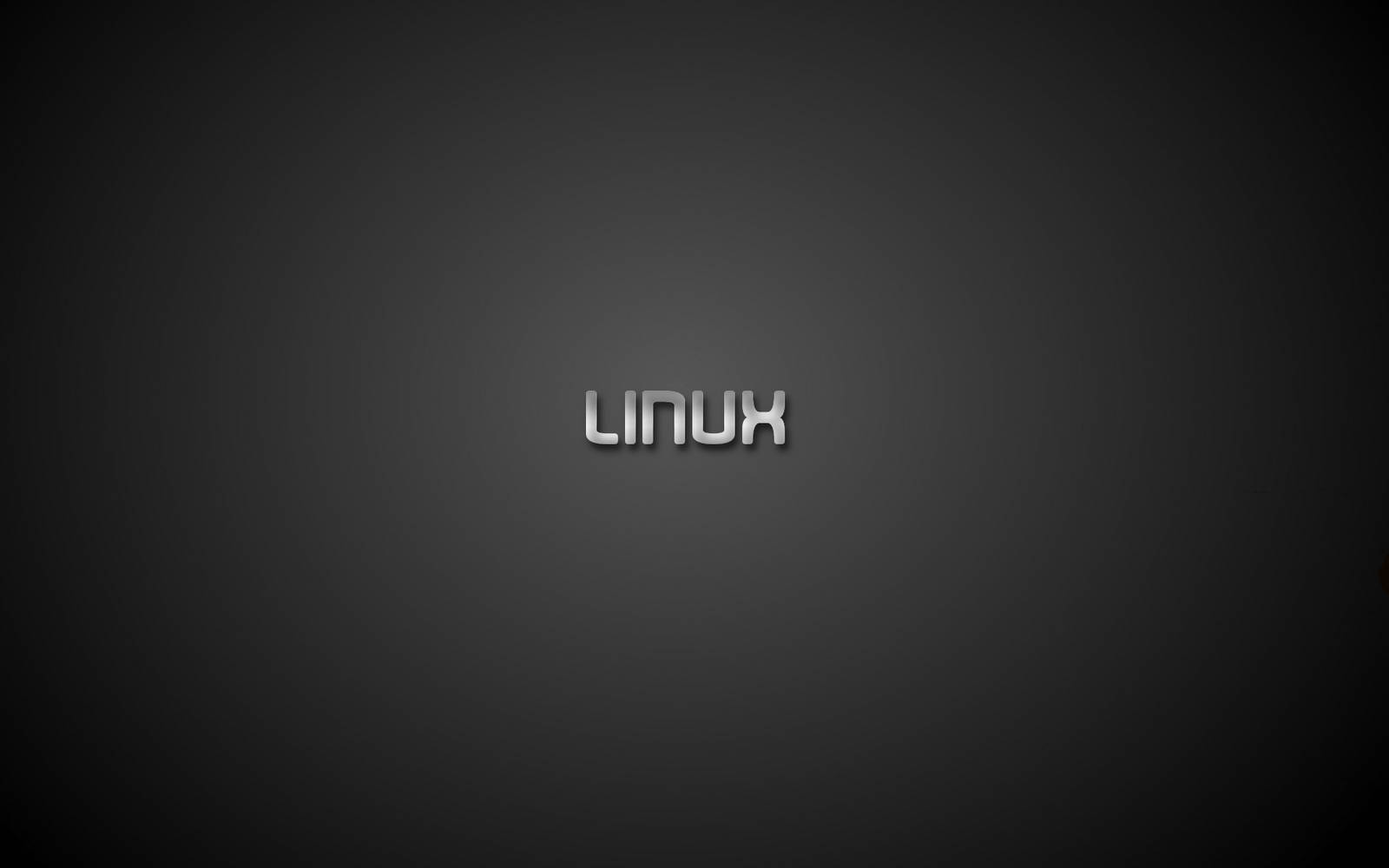 桌面 桌布 壁紙 — 「Linux」一詞以金屬銀色文字居中顯示在深色漸變背景上。