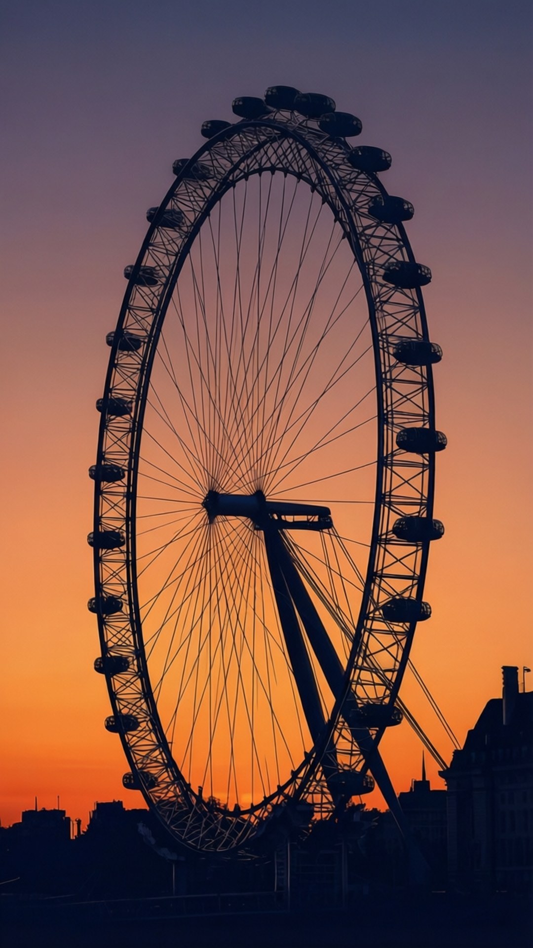 London Eye Sunset Silhouette 壁紙 — 倫敦眼在充滿活力的橙色和紫色日落天空下呈現為黑色剪影。