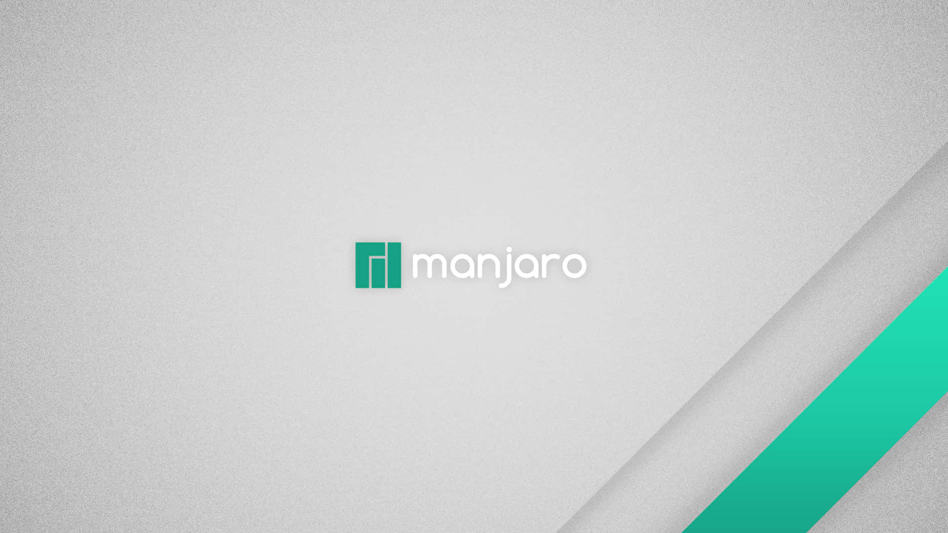 Manjaro 桌布 壁紙 — Manjaro 標誌居中放置在帶有紋理的灰色背景上，並帶有青綠色斜紋。