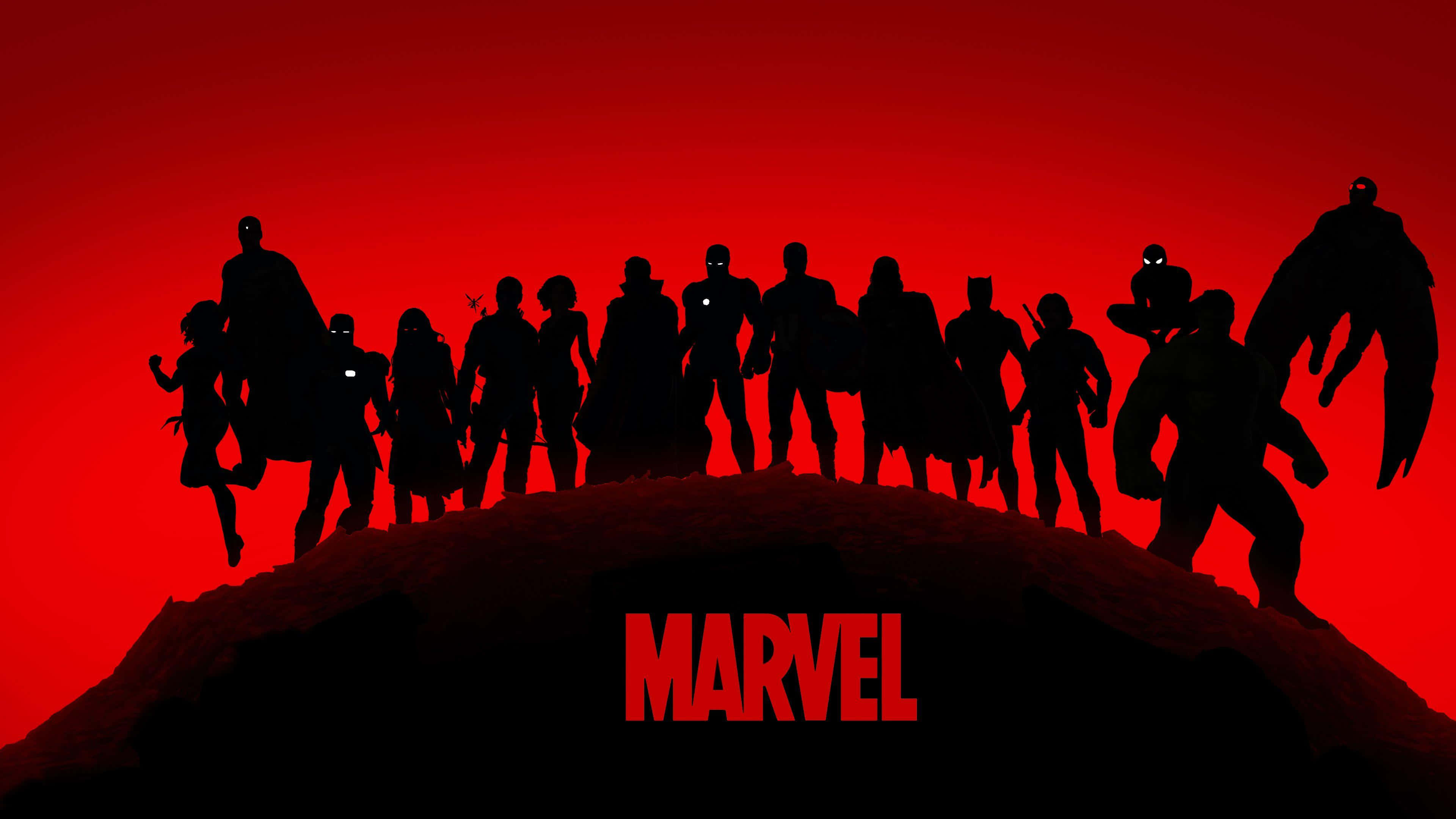 Silhouette 桌布 壁紙 — Marvel 超級英雄的剪影站在山丘上，背景是漸層的紅色天空，下方有 Marvel 標誌。