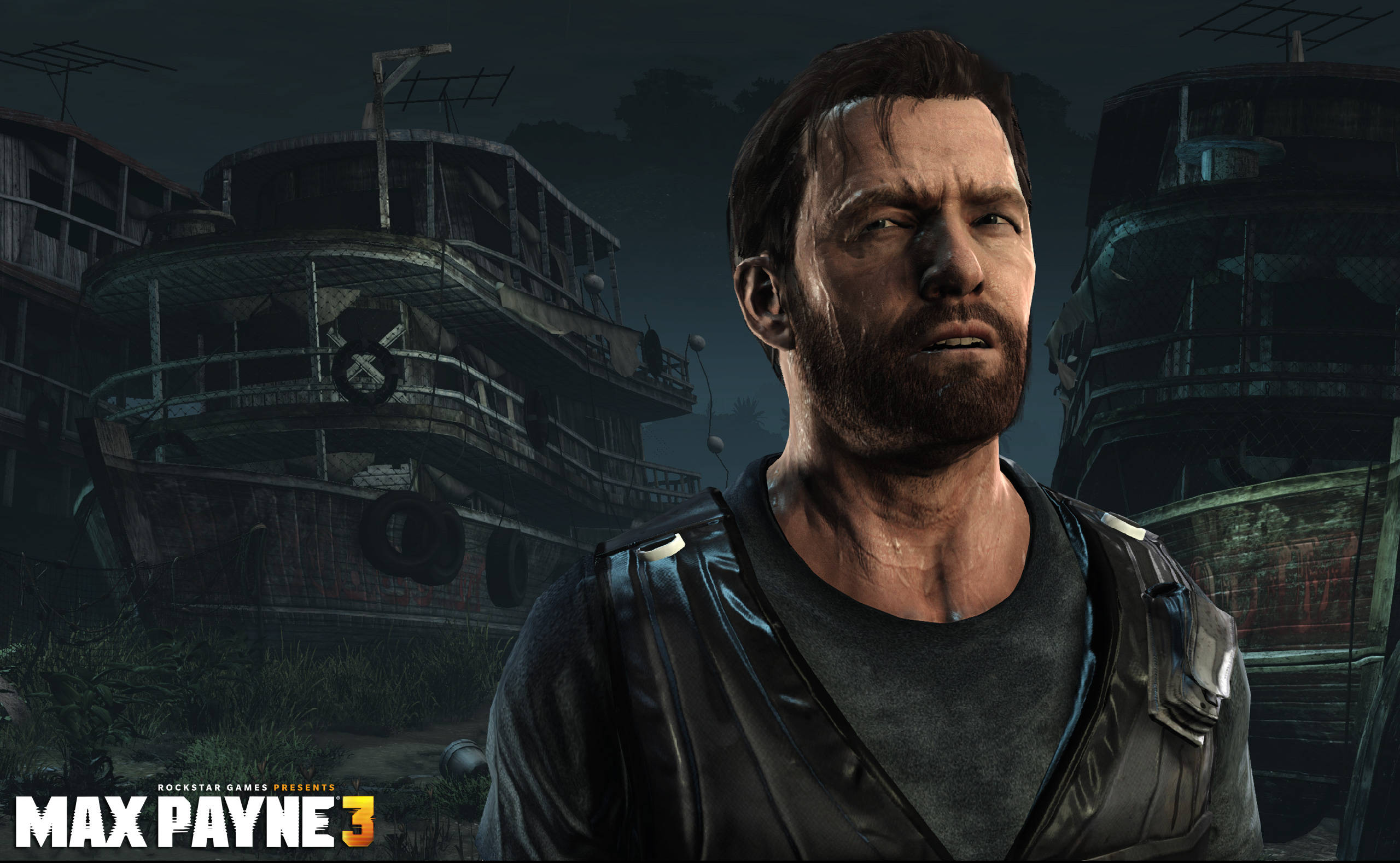 Max Payne 桌布 壁紙 — Max Payne 在黑暗潮濕的城市小巷中，兩旁是腐朽的船隻，在陰沉的夜空下，一張粗糙的特寫。