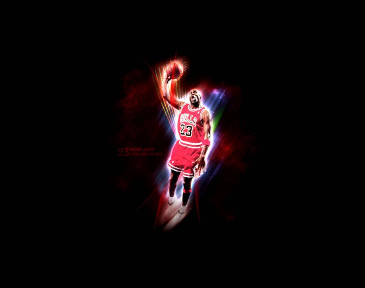 麥可喬丹在半空中灌籃，籃球發光，背景為黑色。 — Jordan Logo 壁紙