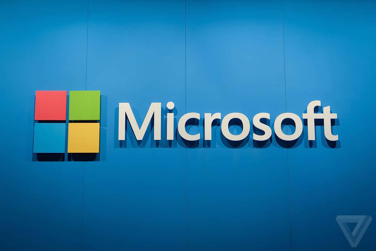 Microsoft 標誌，在藍色背景上有四個彩色方塊。 — Microsoft 壁紙