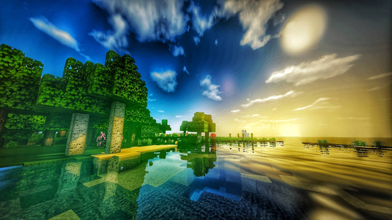 Minecraft 方塊樹木和水面倒映著充滿活力的日落天空。 — 可愛的 Minecraft 壁紙