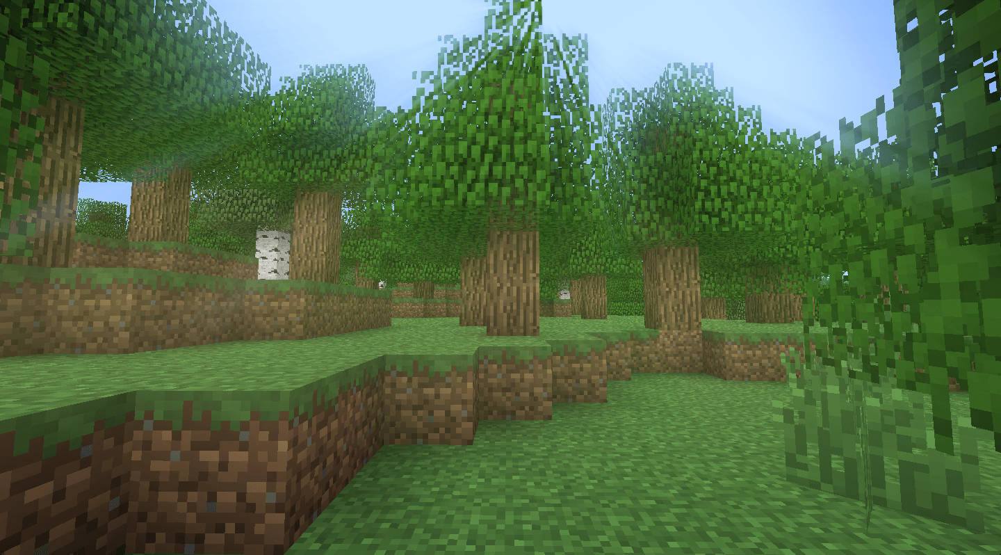 我的世界 高畫質壁紙 桌布 壁紙 — Minecraft 的像素化森林場景，在晴朗的藍天下有方塊狀的綠色樹木和棕色泥土小徑。