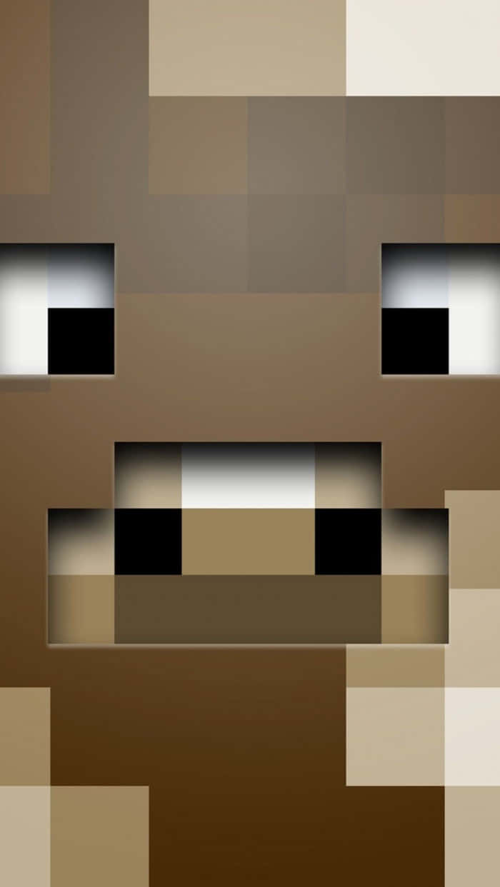 桌布 壁紙 — Minecraft風格的像素化棕色生物特寫，有大白色眼睛和方塊嘴。