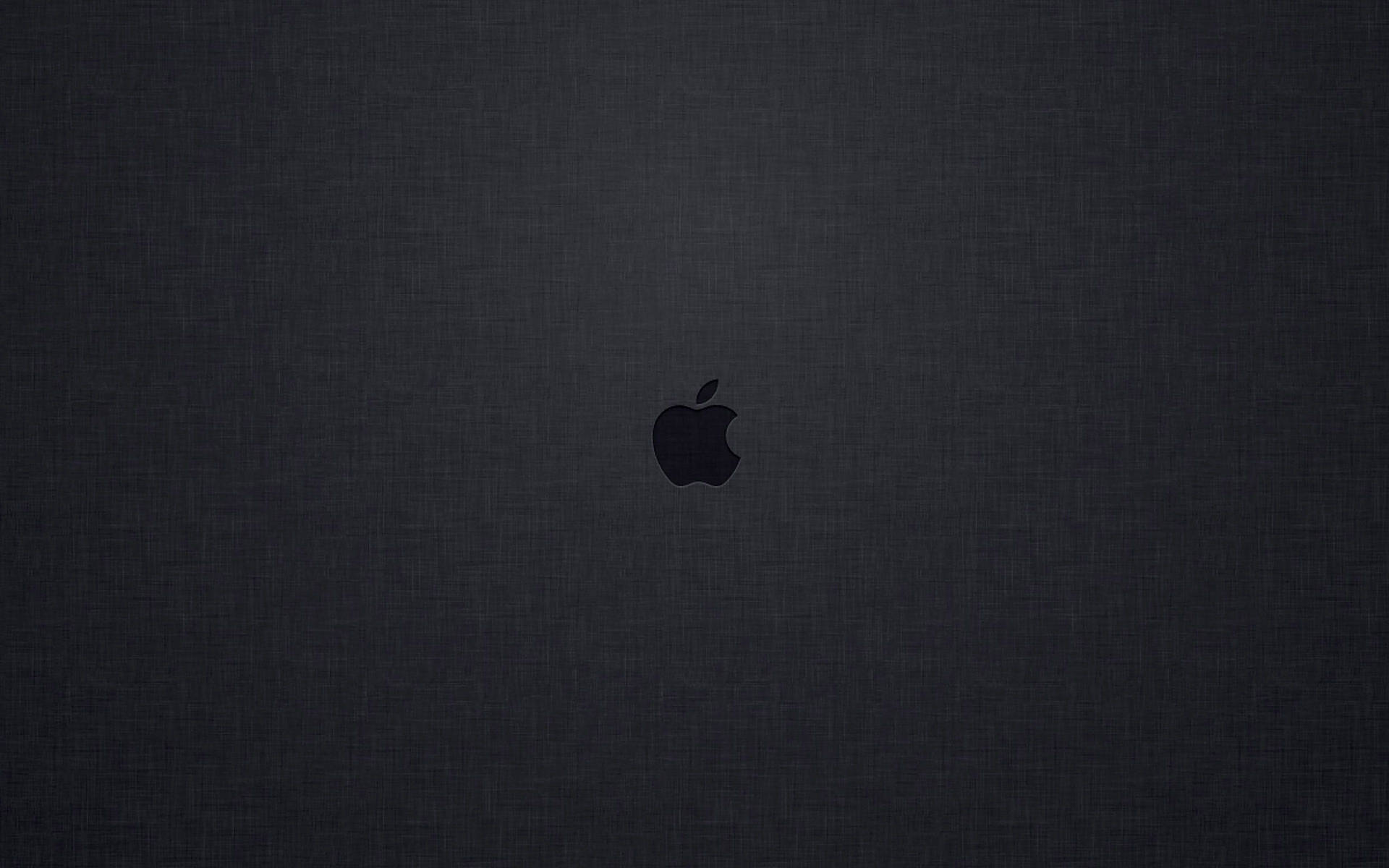 黑色Apple標誌居中於深色紋理背景上。 — 簡約 壁紙