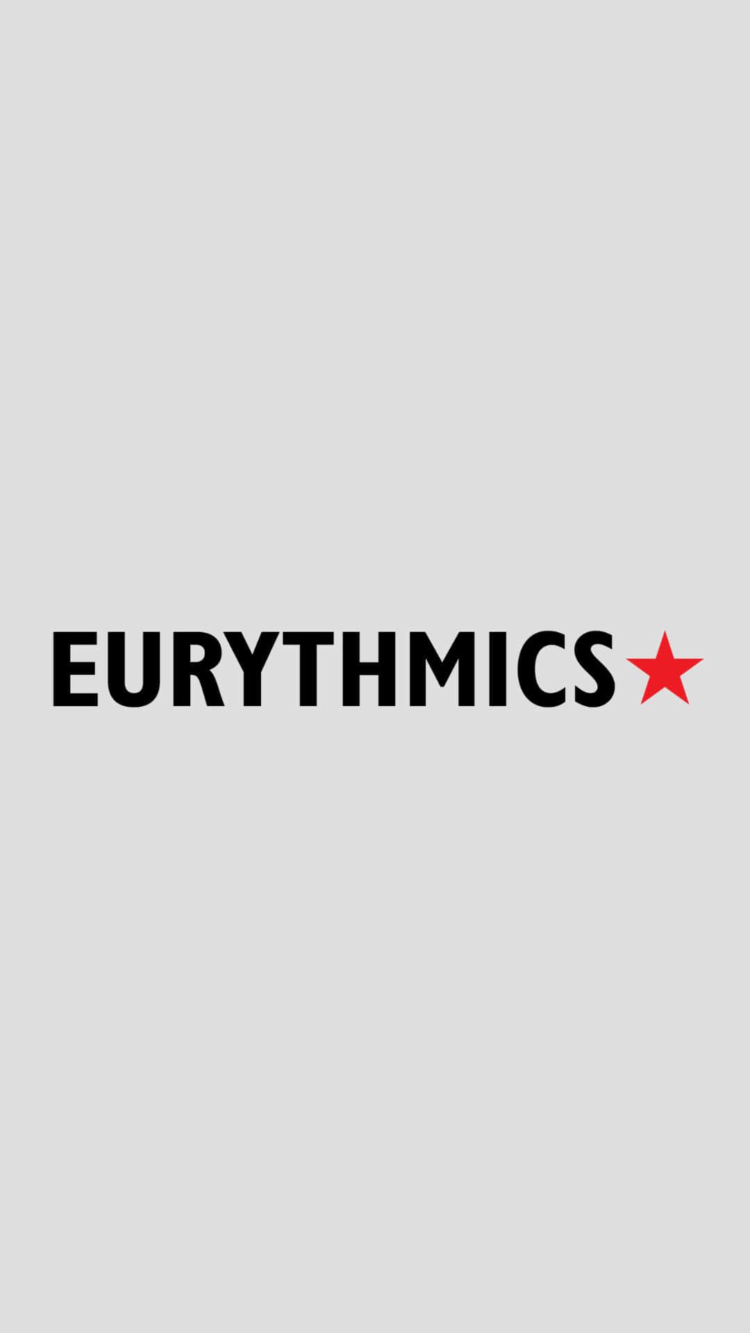  壁紙 — 簡約灰色背景，帶有粗體黑色文字 'EURYTHMICS' 和旁邊的紅色星星。