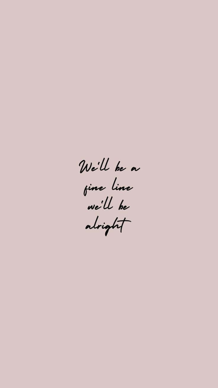  壁紙 — 簡約粉紅色背景，中央有黑色草書文字寫著「We'll be a fine line we'll be alright」。