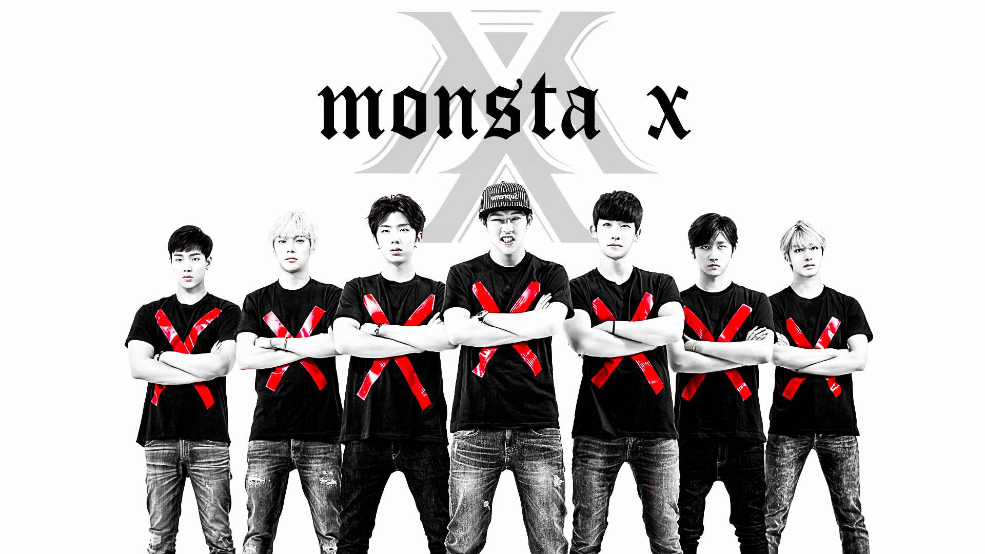 pop 桌布 壁紙 — Monsta X 的七位成員自信地交叉雙臂，穿著帶有紅色 X 標誌的黑色襯衫，背景是純白色。