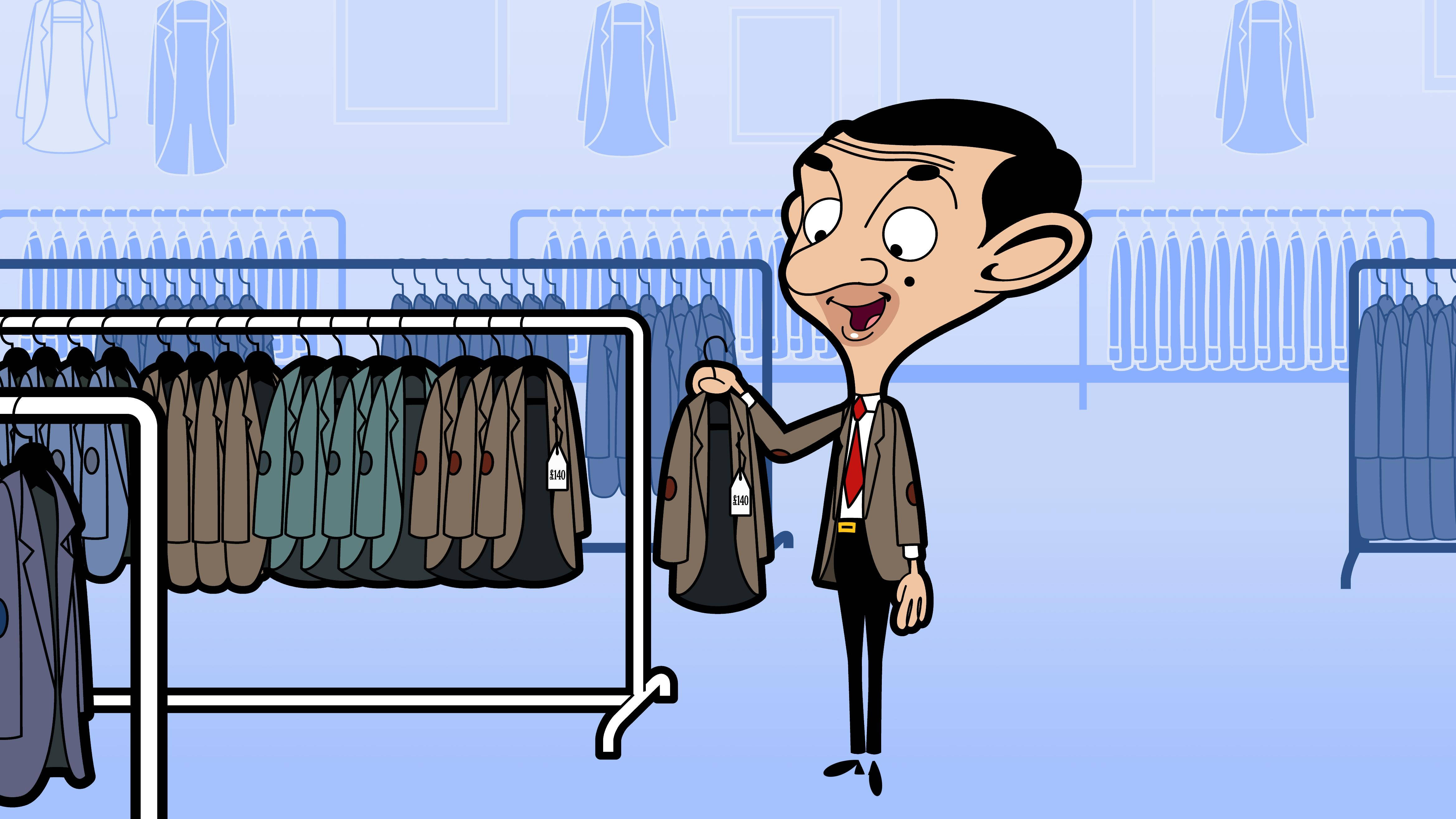 Mr Bean 在服裝店裡拿著外套微笑。 — 4K 壁紙