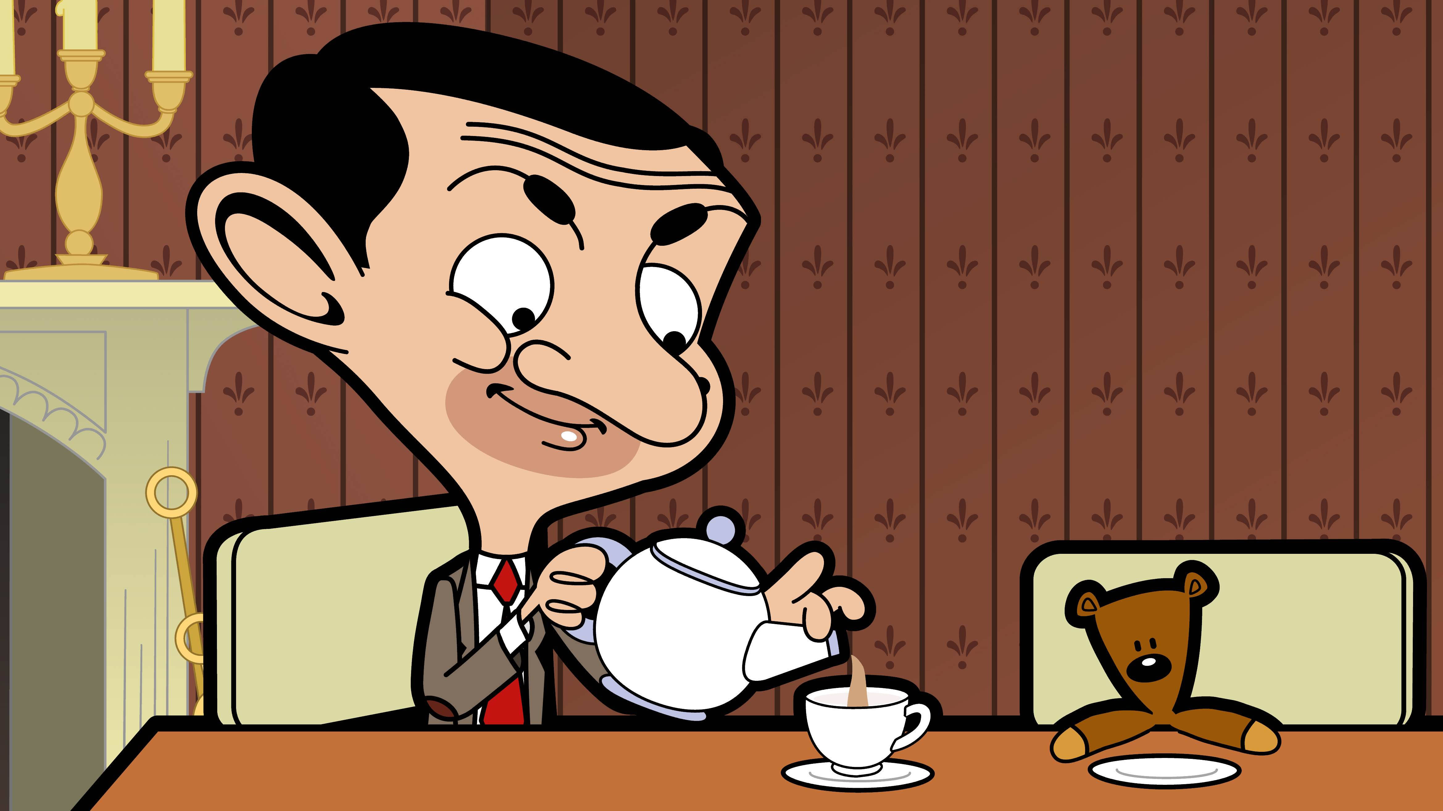 Mr Bean 在餐桌上為泰迪熊倒茶。 — 4K 壁紙