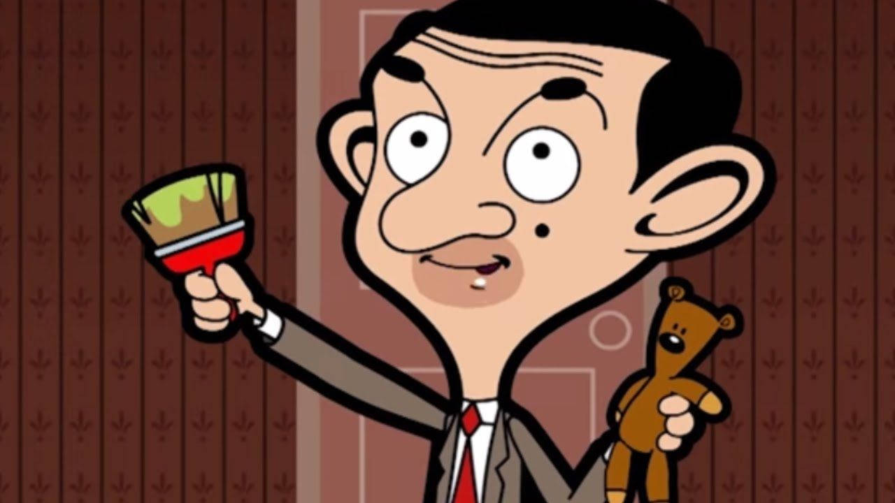 Cartoon 桌布 壁紙 — Mr Bean 卡通角色拿著畫筆和泰迪熊，背景是有圖案的壁紙，表情誇張開心。