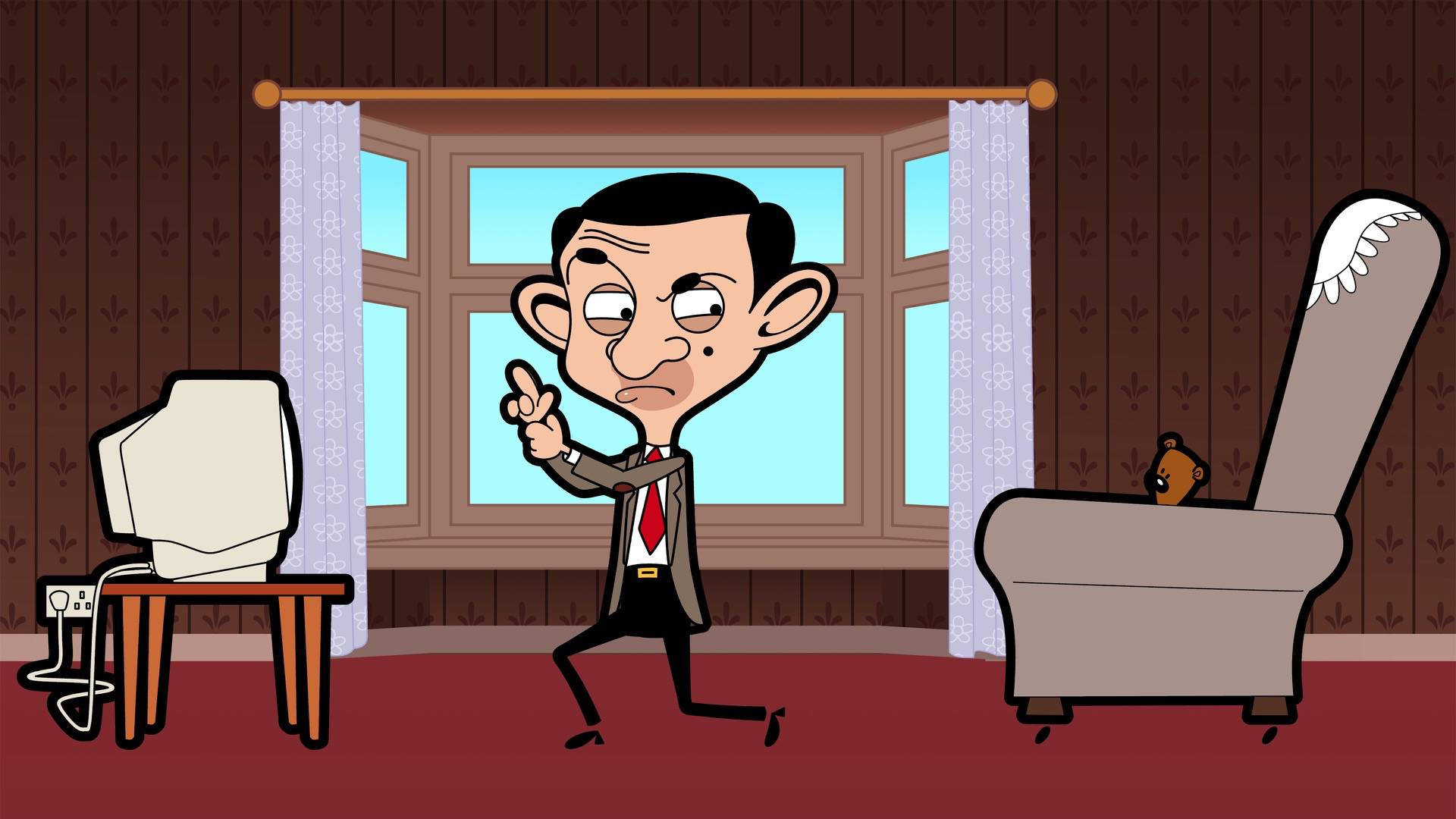 豆豆先生 桌布 壁紙 — Mr. Bean 在卡通房間裡憤怒地指著一部舊電腦，而一隻泰迪熊從椅子上探出頭來。