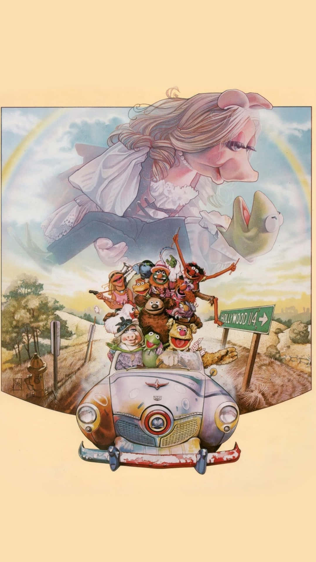  壁紙 — Muppet 角色在彩虹下開心地駕駛一輛復古車，而 Miss Piggy 在上方漂浮並抱著 Kermit。