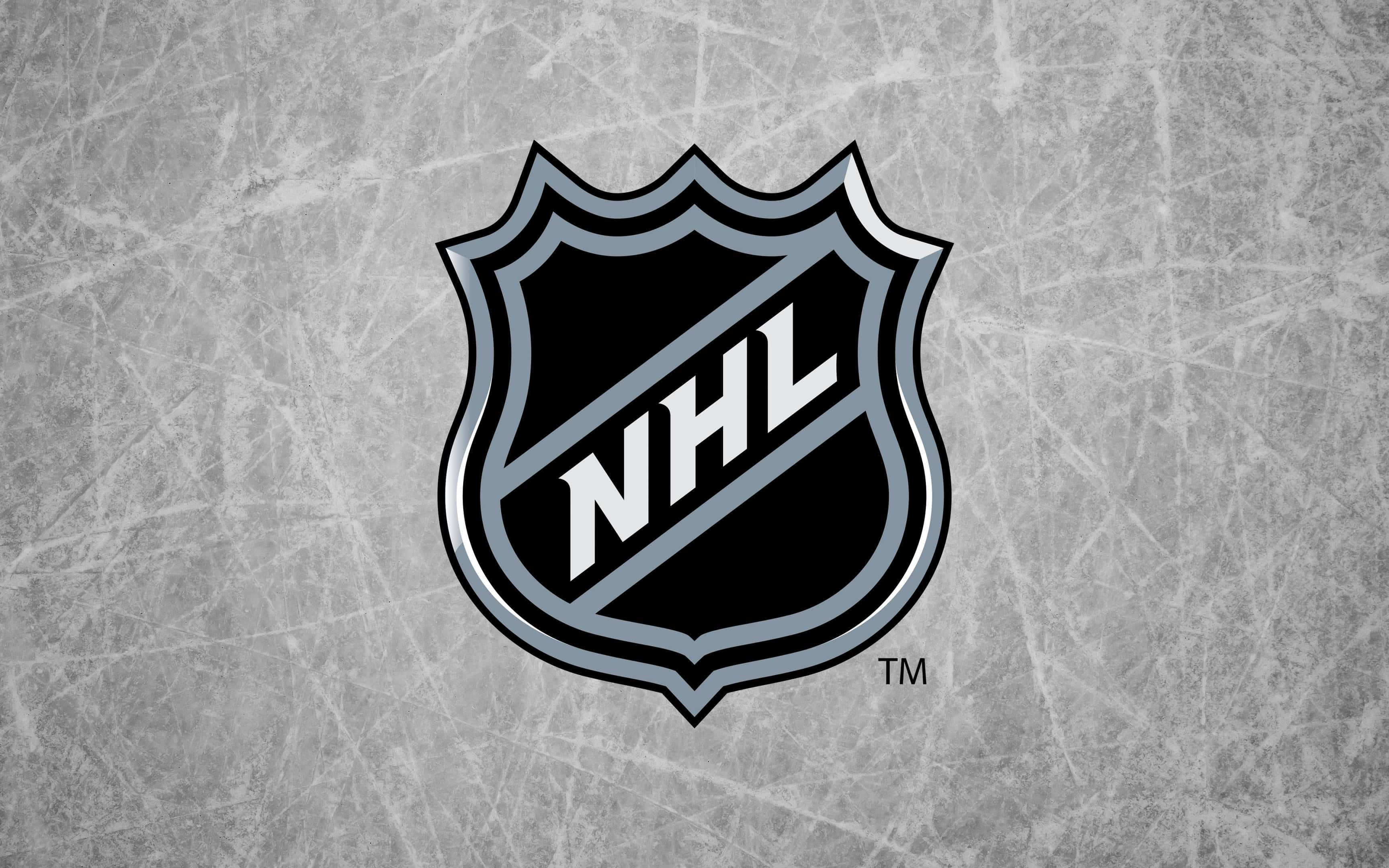 運動 桌布 壁紙 — NHL 標誌居中於有紋理的冰面，帶有可見的刮痕和灰色調。