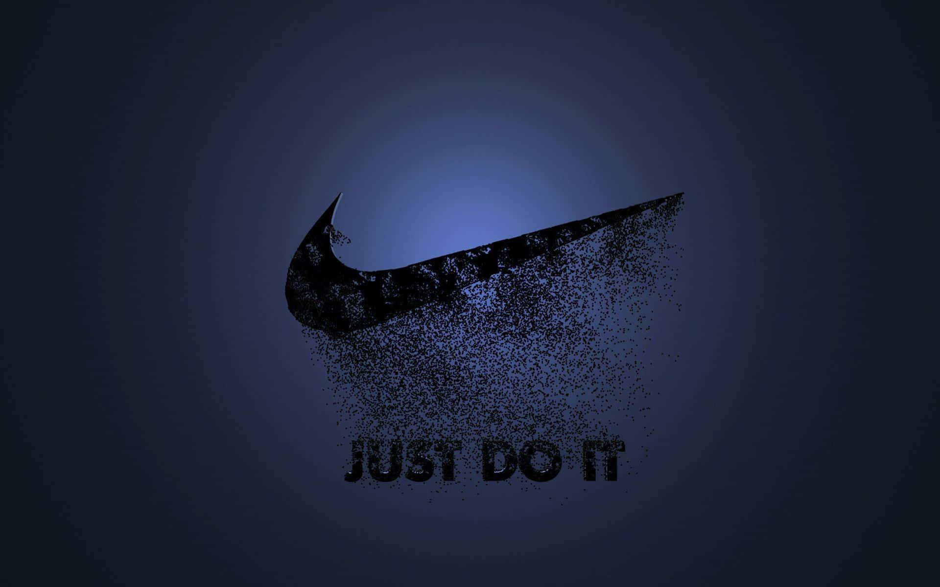桌布 壁紙 — Nike 勾勾標誌在深藍色漸層背景上分解成粒子，下方有「JUST DO IT」文字。
