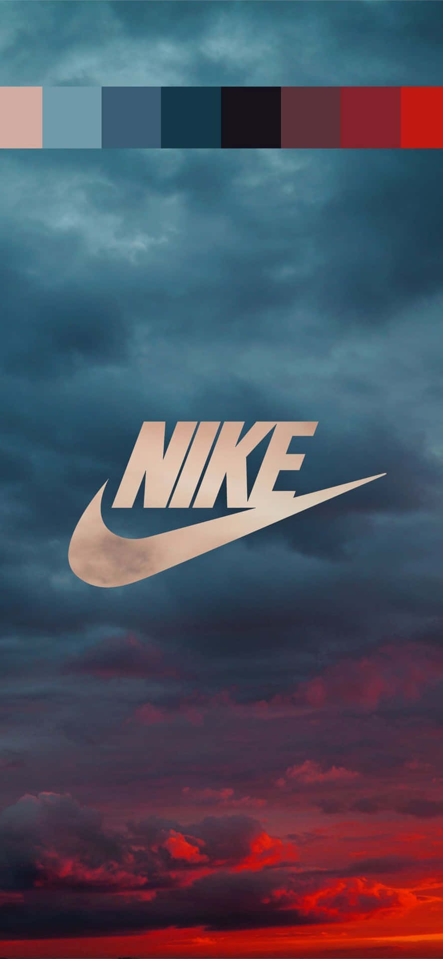 iPhone 桌布 壁紙 — Nike 標誌在戲劇性的天空下發光，天空有藍色上層雲和火紅色的下層雲。