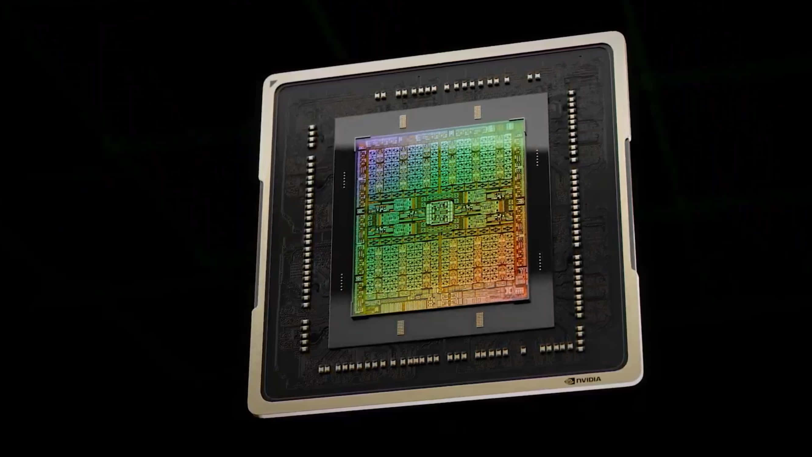 nvidia 桌布 壁紙 — NVIDIA 圖形晶片特寫，在黑色背景下發出彩虹電路光芒。