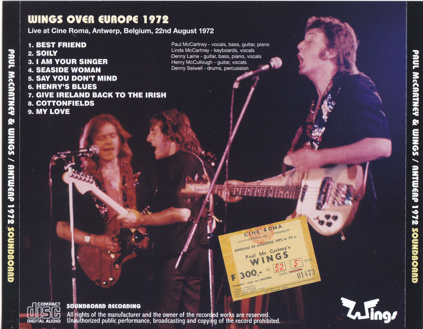 Album Cover 桌布 壁紙 — Paul McCartney 與 Wings 於 1972 年在舞台燈光下以吉他和麥克風進行現場表演。