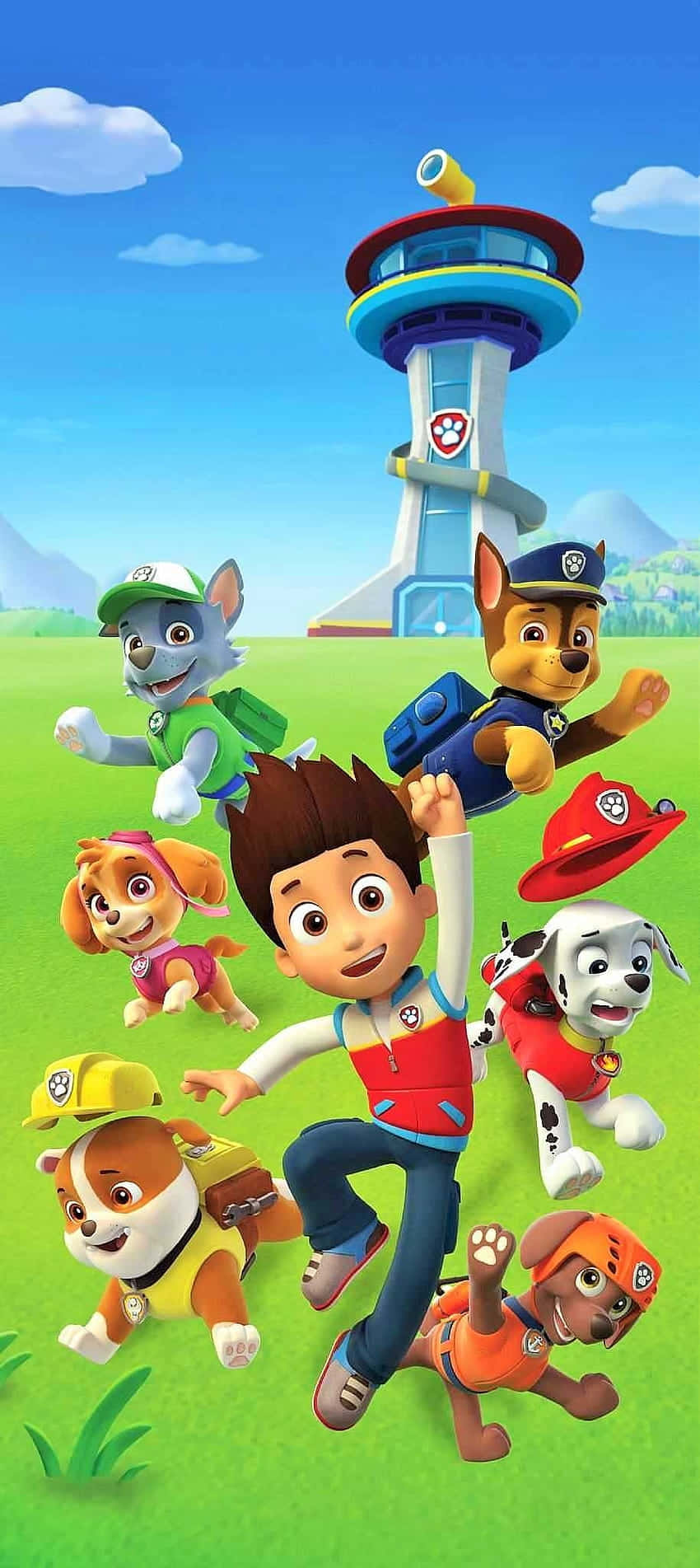 Paw Patrol 角色在塔附近的草地上奔跑 — 汪汪隊立大功 GIF 壁紙